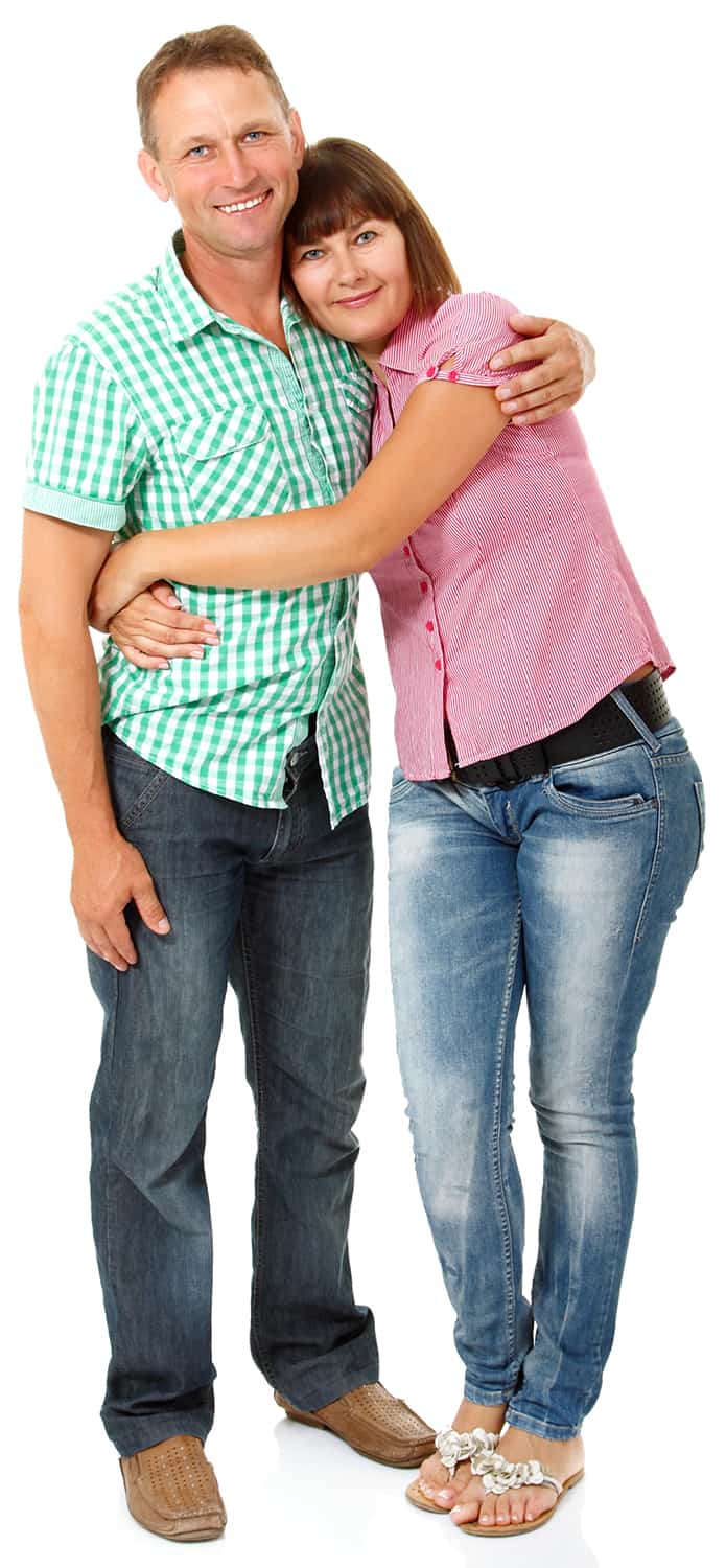 Happy mid adult wife and husband having fun and smiling over whi Couple Image for YourHouseForCash